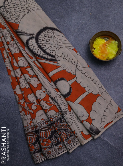 Kalamkari cotton saree orange and black with allover prints and printed border