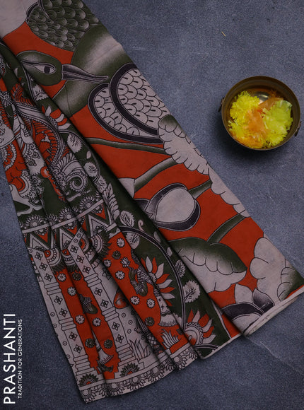 Kalamkari cotton saree sap green and orange with allover prints and long printed border