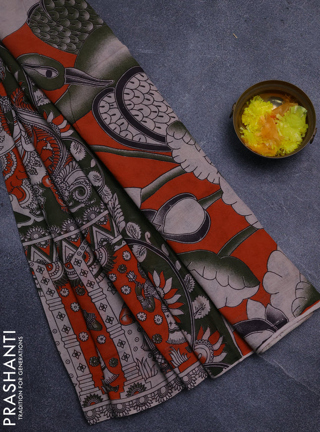 Kalamkari cotton saree sap green and orange with allover prints and long printed border