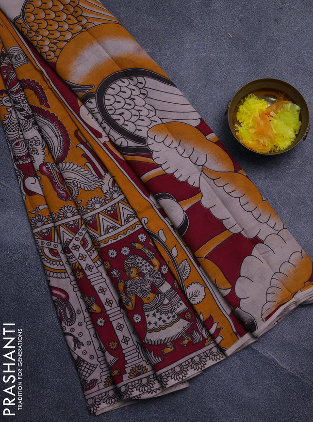 Kalamkari cotton saree mustard yellow and magenta pink with allover prints and long printed border