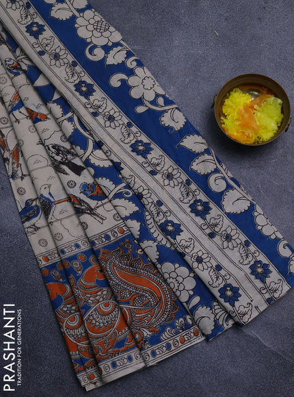 Kalamkari cotton saree beige and orange with allover prints and long printed border