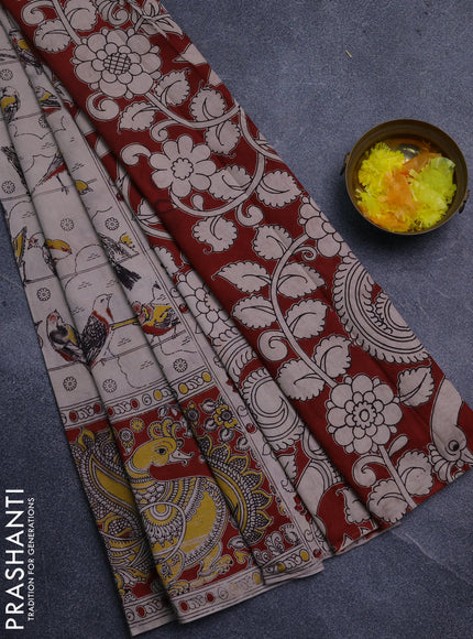 Kalamkari cotton saree beige and rust shade with allover prints and long printed border
