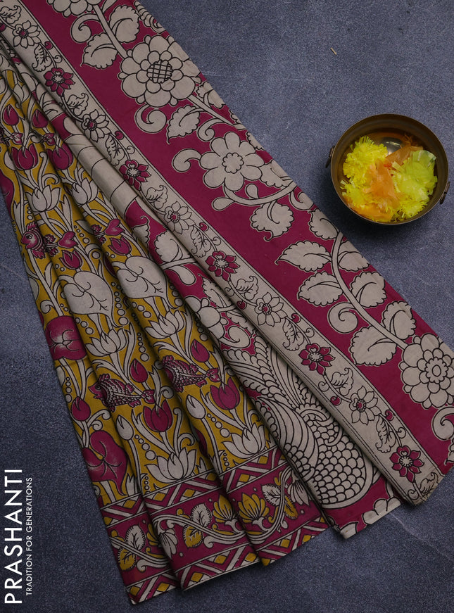 Kalamkari cotton saree yellow and magenta pink with allover prints and printed border