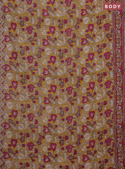 Kalamkari cotton saree yellow and magenta pink with allover prints and printed border