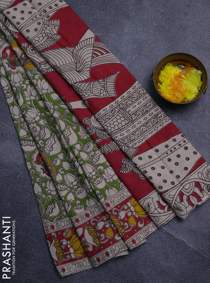 Kalamkari cotton saree light green and pink with allover prints and printed border
