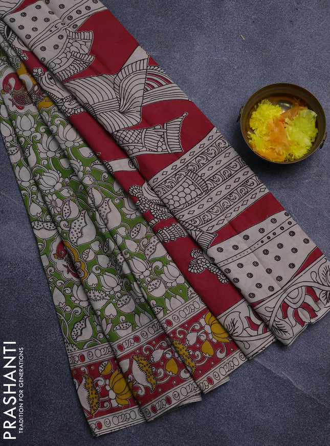 Kalamkari cotton saree light green and pink with allover prints and printed border