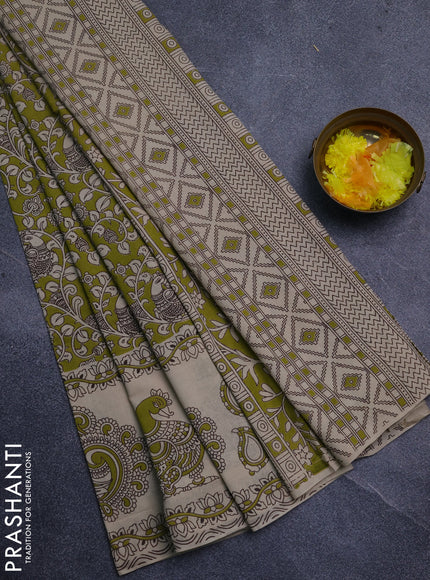 Kalamkari cotton saree light green and beige with allover prints and long printed border
