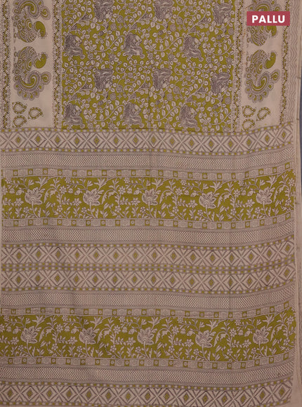 Kalamkari cotton saree light green and beige with allover prints and long printed border