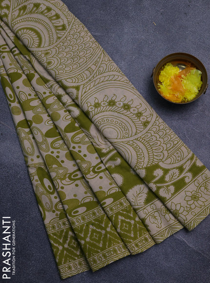Kalamkari cotton saree light green and beige with allover geomatric prints and printed border