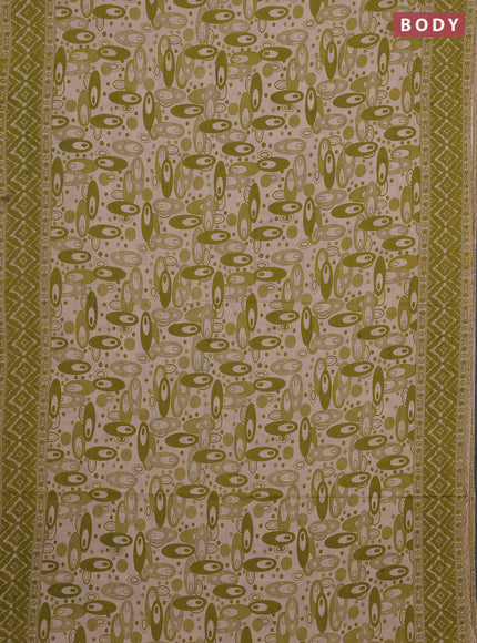 Kalamkari cotton saree light green and beige with allover geomatric prints and printed border