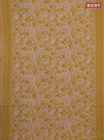 Kalamkari cotton saree yellow and beige with allover geomatric prints and printed border