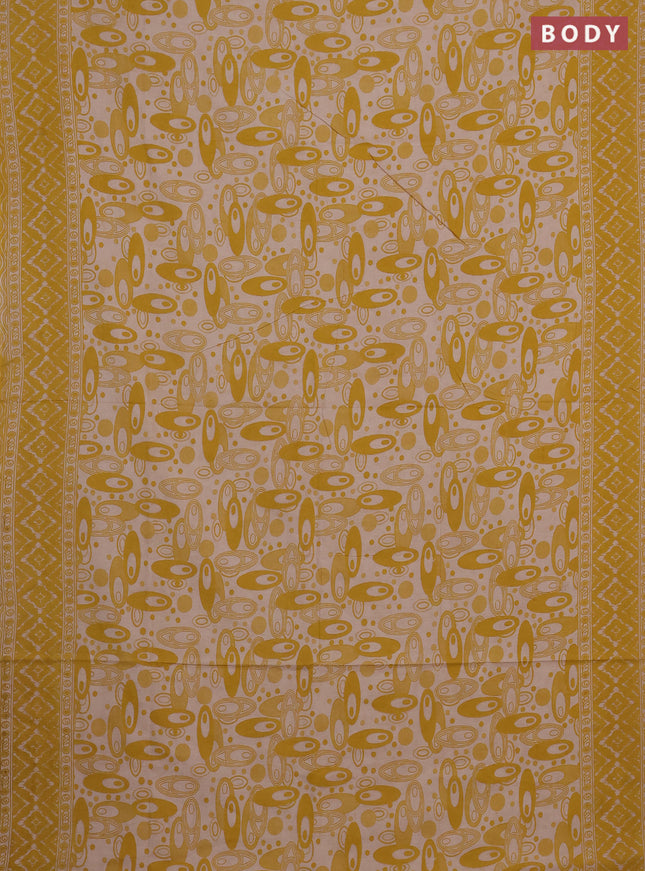 Kalamkari cotton saree yellow and beige with allover geomatric prints and printed border