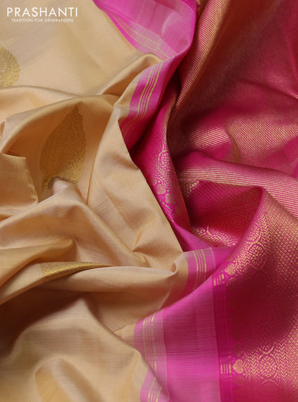 Pure kanchipuram silk saree cream and pink with zari woven buttas and rich zari woven border