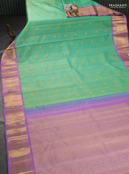 Pure kanchipuram silk saree teal green shade and lavender with annam & rudhraksha zari woven buttas and zari woven border