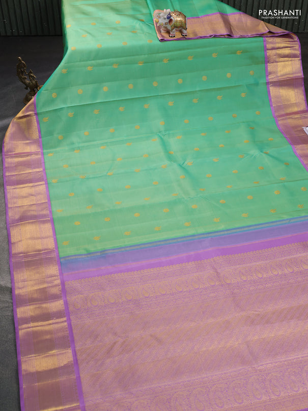 Pure kanchipuram silk saree teal green shade and lavender with annam & rudhraksha zari woven buttas and zari woven border