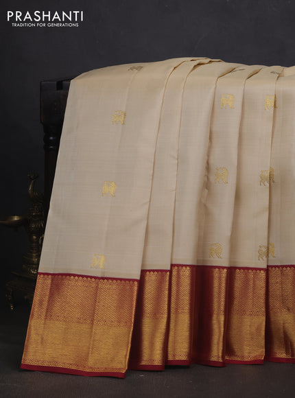Pure kanchipuram silk saree cream and dark pink with zari woven buttas and rich zari woven border