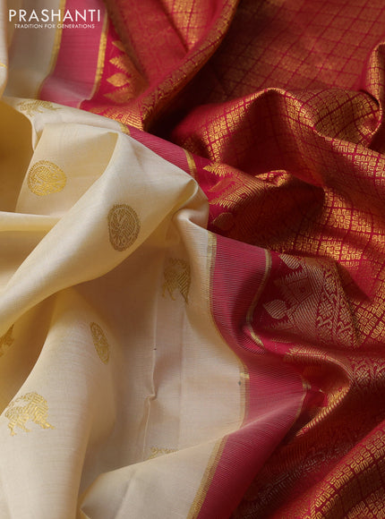 Pure kanchipuram silk saree cream and dark pink with zari woven buttas and rich zari woven border