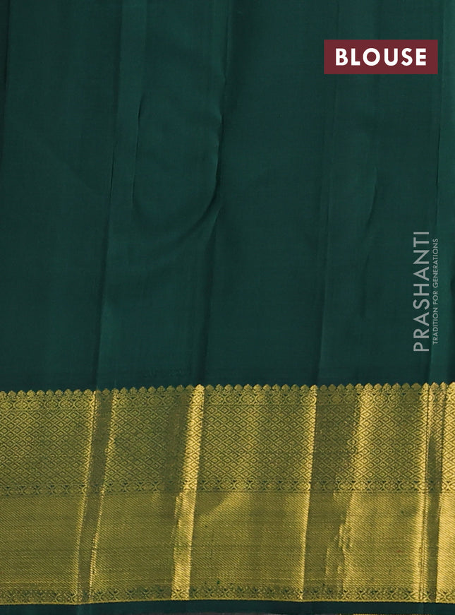 Pure kanchipuram silk saree pink and bottle green with zari woven buttas and rich zari woven korvai border