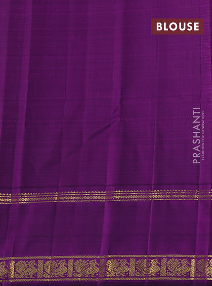 Pure kanchipuram silk saree pastel green and purple with allover stripe pattern and rich zari woven butta border