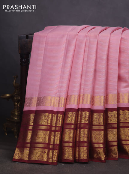 Pure kanchipuram silk saree mild peach pink and maroon with allover silver & gold zari stripe pattern and long zari woven border