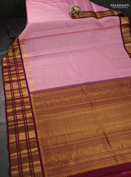 Pure kanchipuram silk saree mild peach pink and maroon with allover silver & gold zari stripe pattern and long zari woven border