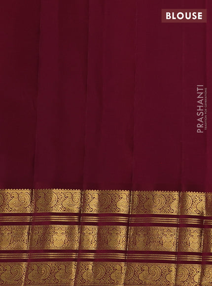 Pure kanchipuram silk saree mild peach pink and maroon with allover silver & gold zari stripe pattern and long zari woven border