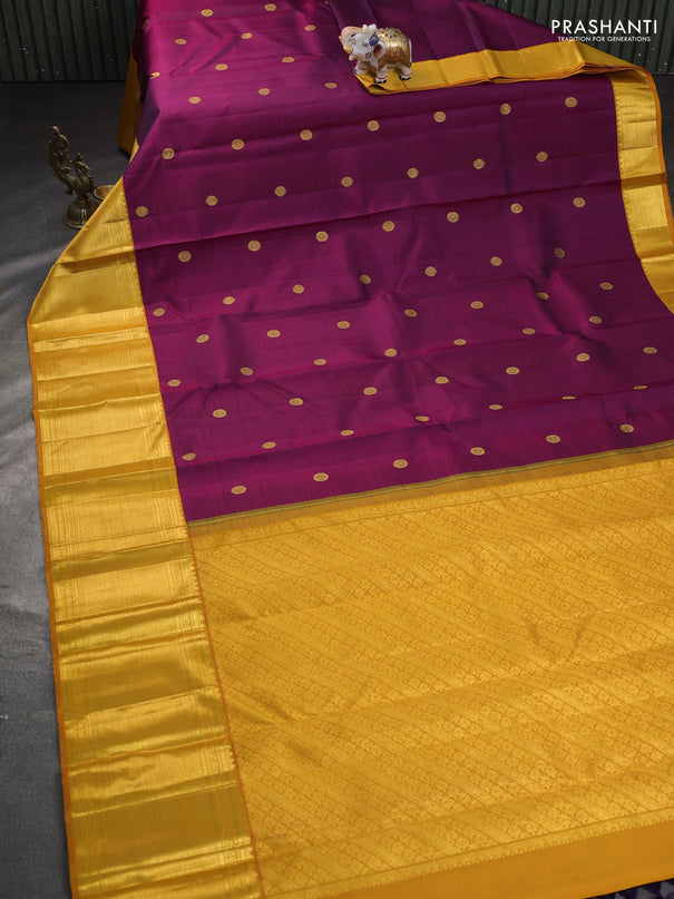 Pure kanchipuram silk saree dual shade of wine and mustard yellow with rudhraksha zari woven buttas and long zari woven border