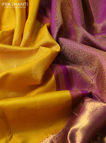 Pure kanchipuram silk saree mustard yellow and purple with paisley zari woven buttas and long zari woven border