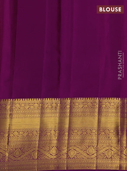 Pure kanchipuram silk saree mustard yellow and purple with paisley zari woven buttas and long zari woven border