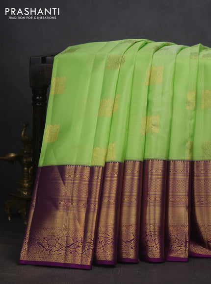 Pure kanchipuram silk saree pista green and purple with zari woven buttas and long zari woven border