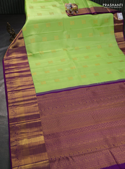 Pure kanchipuram silk saree pista green and purple with zari woven buttas and long zari woven border