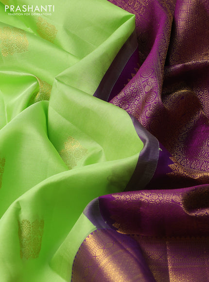 Pure kanchipuram silk saree pista green and purple with zari woven buttas and long zari woven border