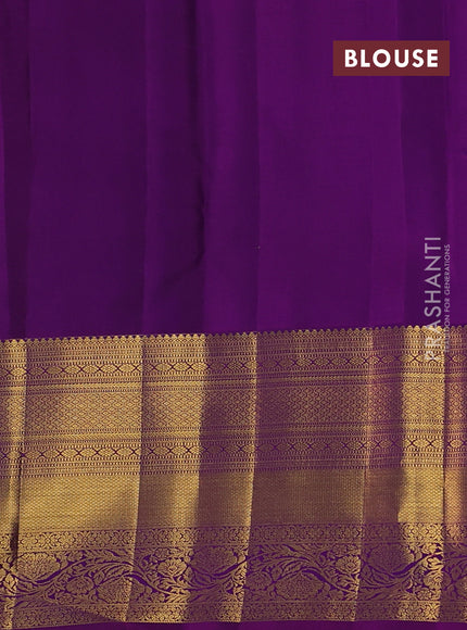 Pure kanchipuram silk saree pista green and purple with zari woven buttas and long zari woven border
