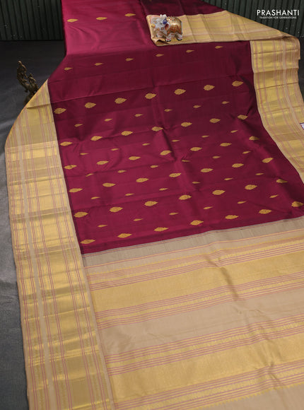 Pure kanchipuram silk saree maroon and sandal with zari woven buttas and long zari woven border