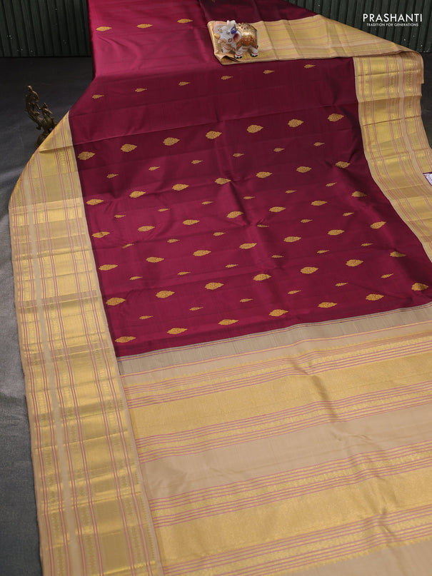 Pure kanchipuram silk saree maroon and sandal with zari woven buttas and long zari woven border