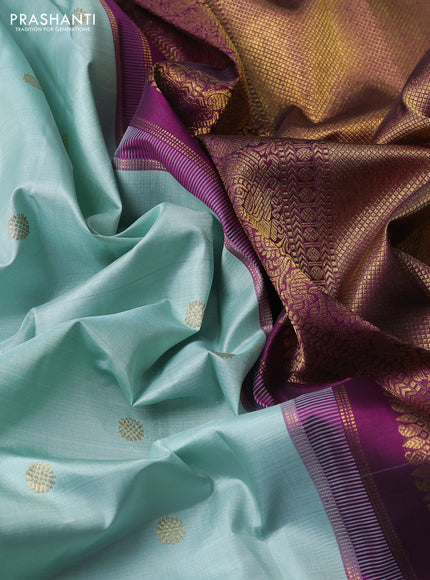 Pure kanchipuram silk saree pastel blue shade and purple with zari woven buttas and rich zari woven temple design border border