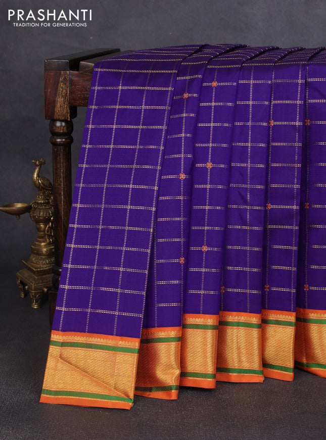 Pure kanchipuram silk saree violet and rustic orange shade with allover zari checks & buttas and long zari woven border