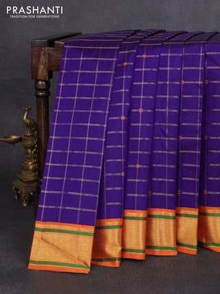 Pure kanchipuram silk saree violet and rustic orange shade with allover zari checks & buttas and long zari woven border