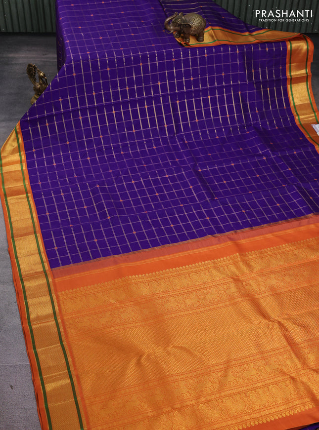 Pure kanchipuram silk saree violet and rustic orange shade with allover zari checks & buttas and long zari woven border