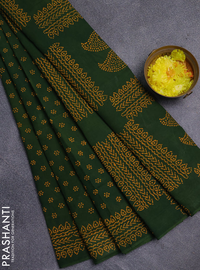 Sungudi cotton saree green with allover butta prints and printed border