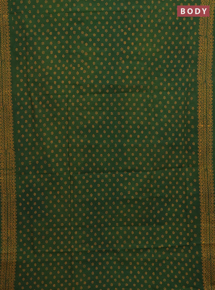 Sungudi cotton saree green with allover butta prints and printed border