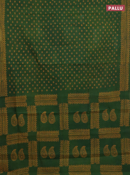Sungudi cotton saree green with allover butta prints and printed border