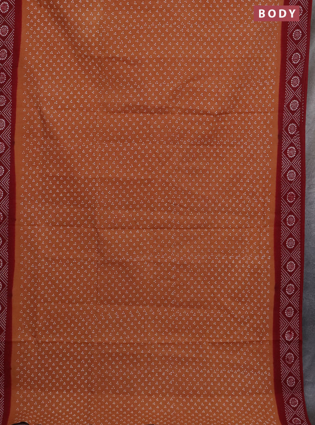 Sungudi cotton saree dark sandal and sandal with allover butta prints and printed border