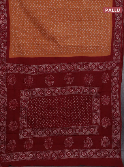 Sungudi cotton saree dark sandal and sandal with allover butta prints and printed border
