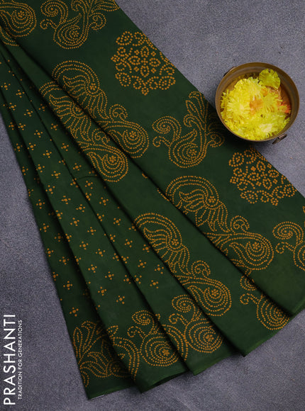 Sungudi cotton saree green with allover butta prints and printed border