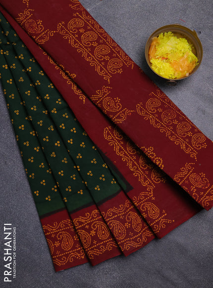 Sungudi cotton saree green and maroon with allover batik prints and printed border