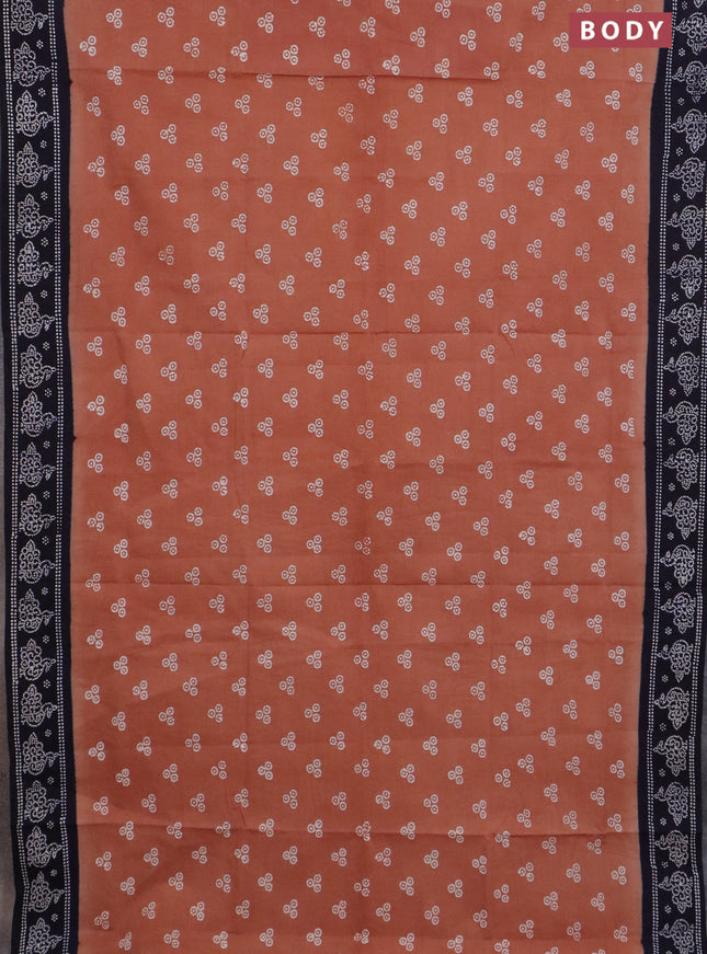 Sungudi cotton saree rust shade and navy blue with allover batik prints and printed border