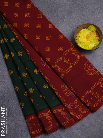 Sungudi cotton saree bottle green and maroon with allover batik prints and printed border
