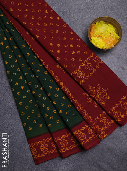 Sungudi cotton saree bottle green and maroon with allover butta prints and printed border