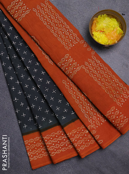 Sungudi cotton saree elephant grey and dark mustard with allover butta prints and printed border